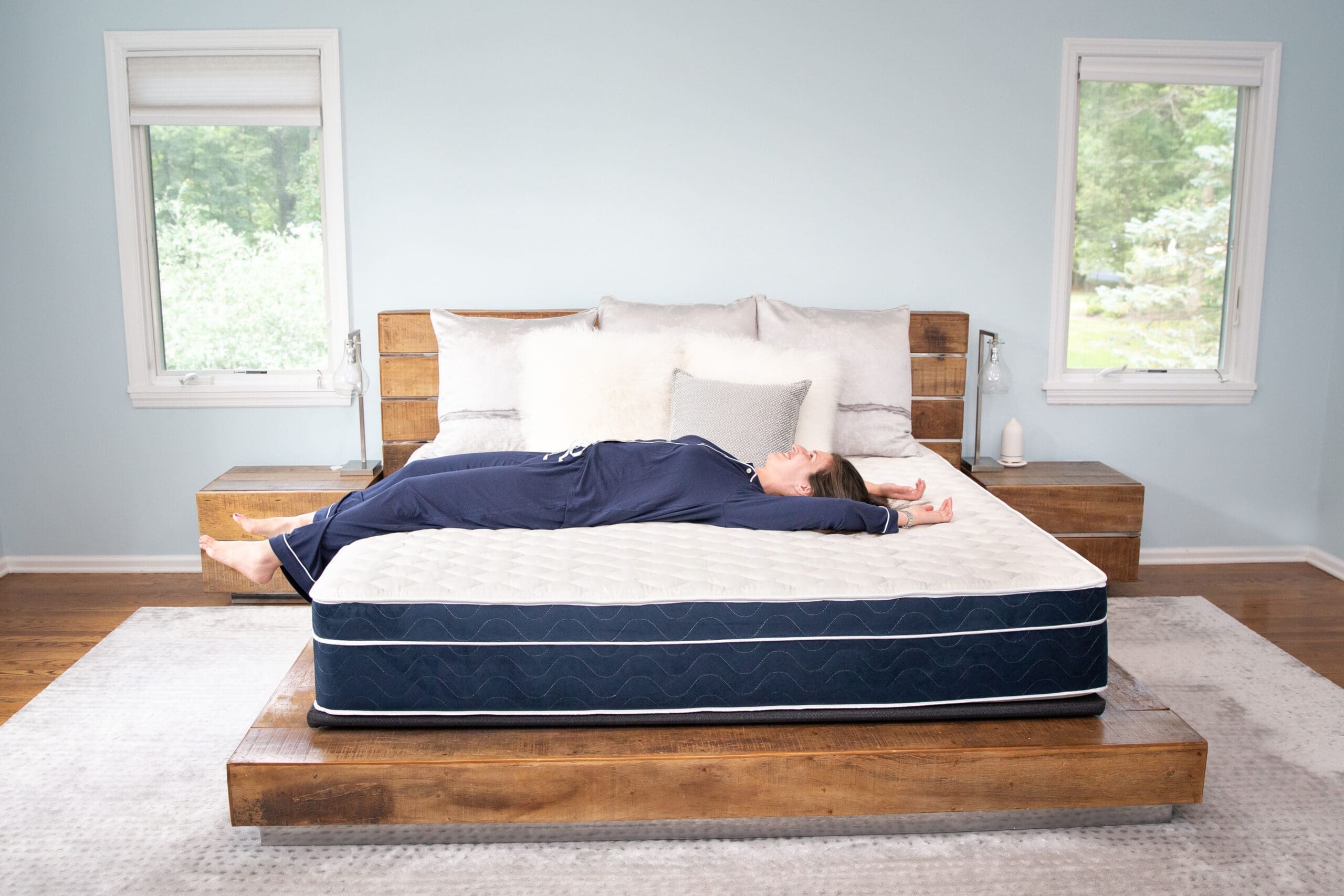 woman lying in bed worry free