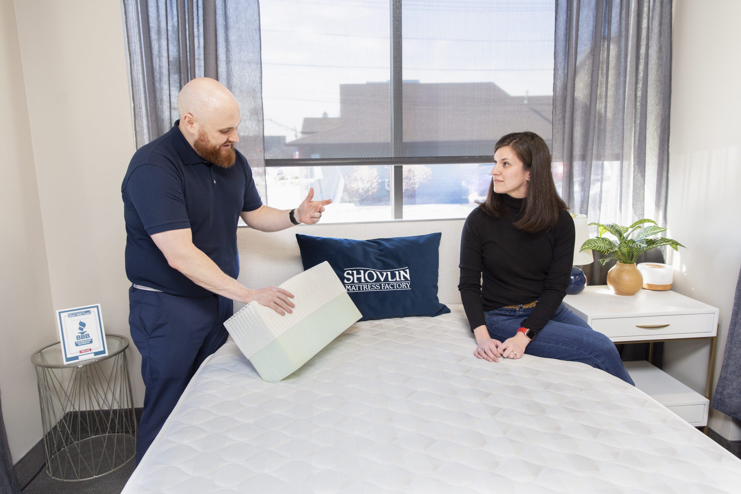 customer shopping for a mattress at shovlin mattress store